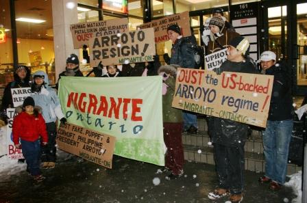 Filipinos protest in Toronto condemning the corruption of Gloria "Macapal" Arroyo. Oust Gloria!